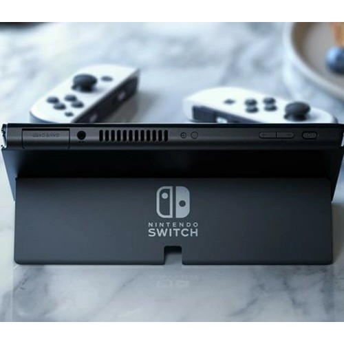 Игроввя приставка Nintendo Switch OLED Neon (синий/красный) 9